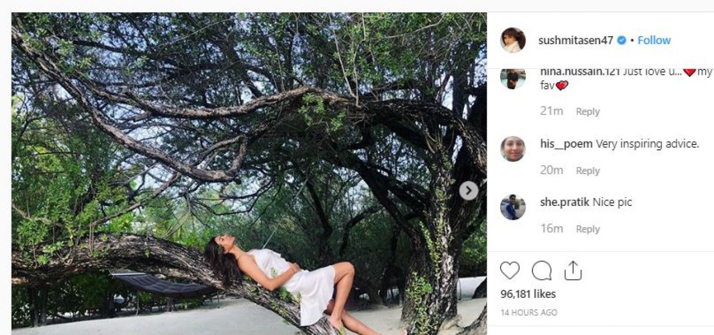 Sushmita Sen’s looks like a fairy as she lies down on Tree in pretty white dress