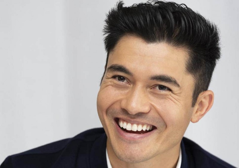 Actor Henry Golding and his wife adopted dog