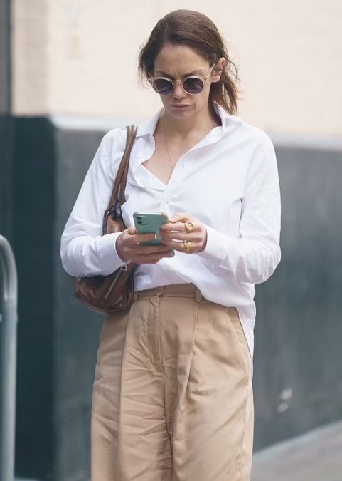 Ruth Wilson shows off cool style in white shirt and cream pants