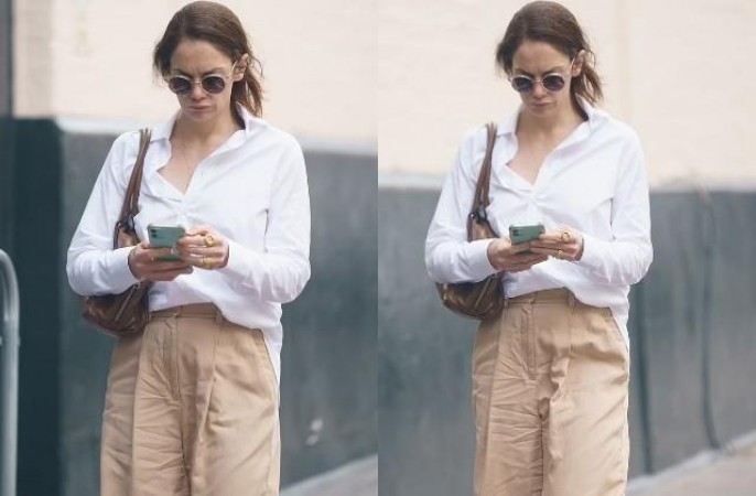 Ruth Wilson shows off cool style in white shirt and cream pants