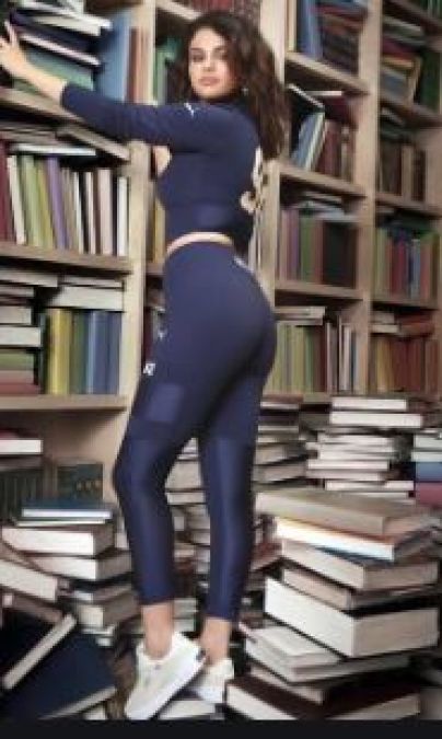 Selena Gomez draws flak for standing on books