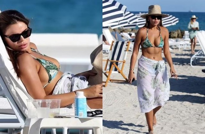 Brooks Nader makes a splash in a patterned monokini while hanging out with her friends in Miami Beach