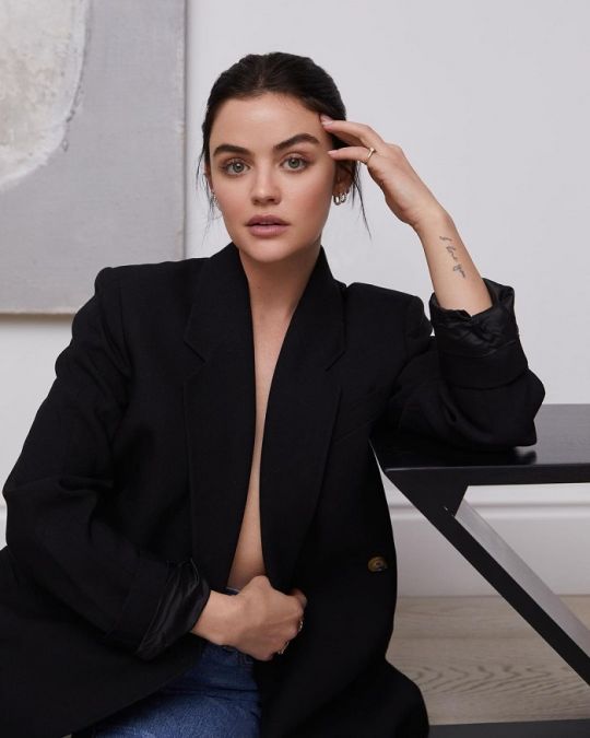 Wearing denim jeans and open coat, Lucy Hale set the internet on fire.