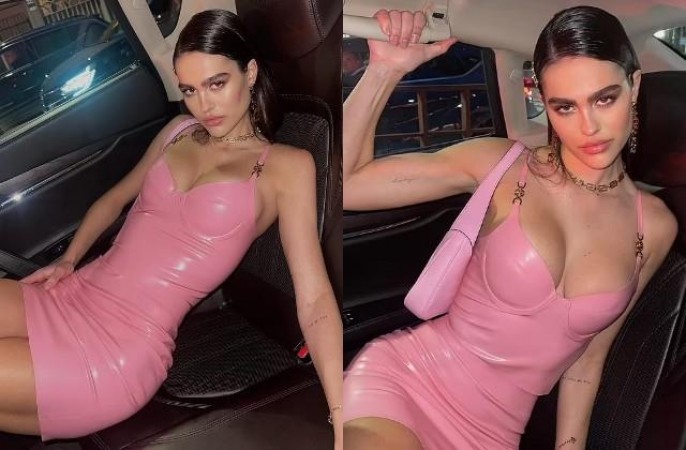 Supermodel Amelia wreaking havoc in a skin-tight short dress