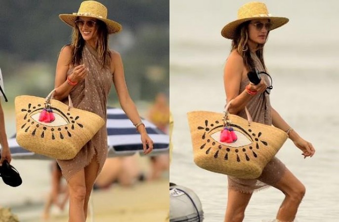 Alessandra Ambrosio was seen on the beach wearing a transparent dress