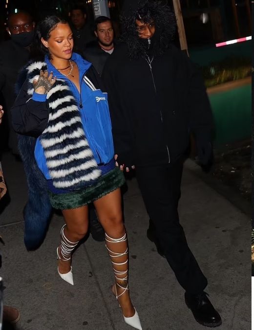 Rihanna spotted with her boyfriend in a blue and black windbreaker jacket