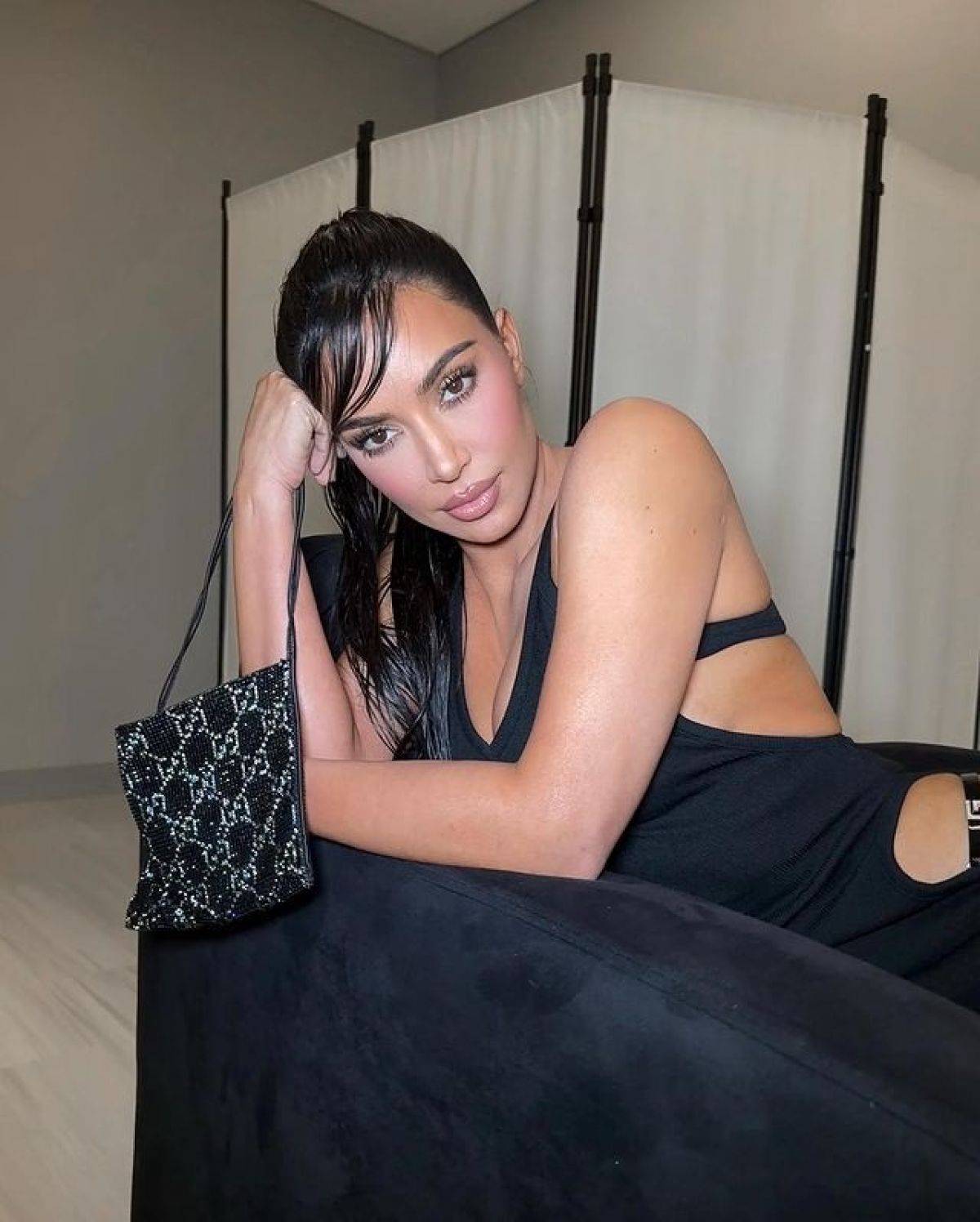 Kim adds boldness in black one piece