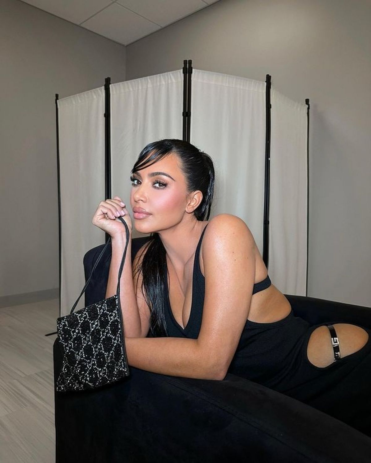 Kim adds boldness in black one piece