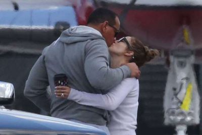 Jennifer Lopez seen romancing at the airport with her fiance!