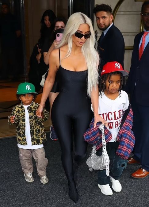 Kim Kardashian spotted outside hotel with kids