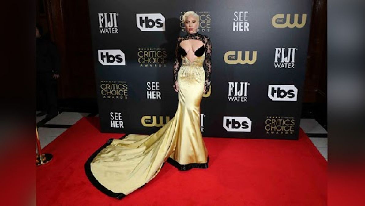 Lady Gaga looking stunning in a deep neckline gown, see pictures