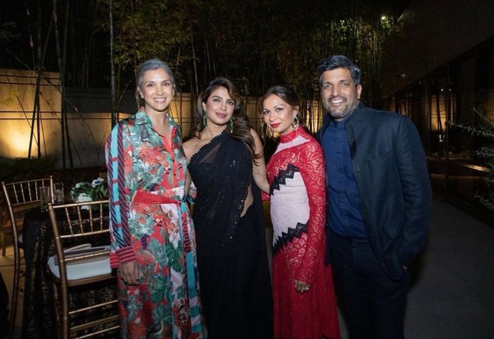 For the first time since becoming a mother, Priyanka arrives at the event wearing black saree