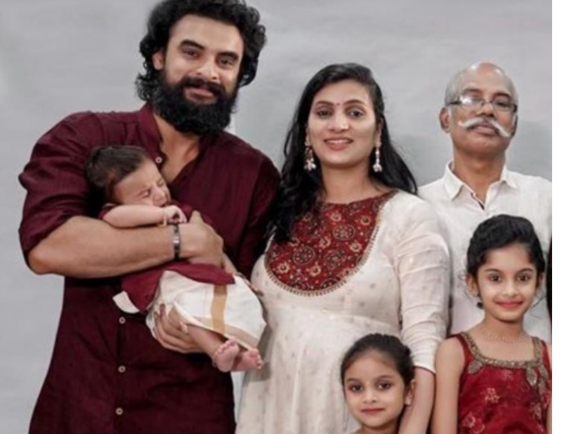 Tovino Thomas shares photo with newborn son and family members
