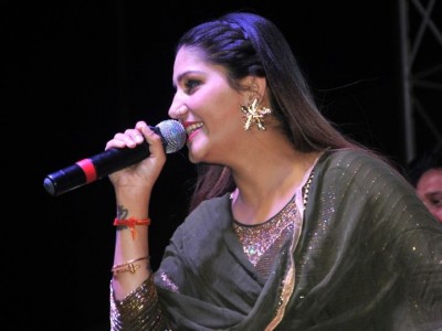 Watch': Sapna Choudhary suddenly slips down while performing on stage,