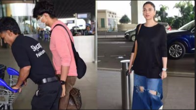 Siddharth was spotted at the airport with his wife.