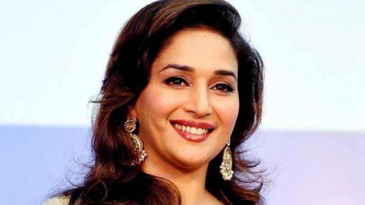 You may not have seen this sexy look of 'Madhuri Dixit' in a red sari; see here!