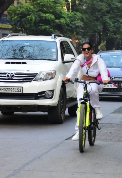 Nia Sharma seen cycling on Mumbai roads with Aditya