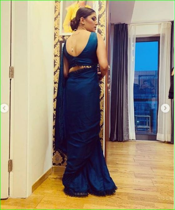 Sapna Chaudhary flaunts her tattoo in a blue sari, check out photos here