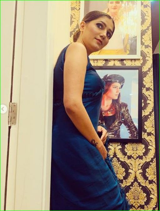 Sapna Chaudhary flaunts her tattoo in a blue sari, check out photos here