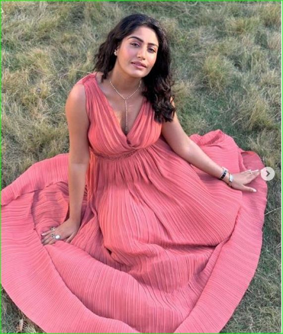 Surabhi Chandna seen posing while sitting on the grass