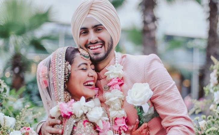 Neha Kakkar gets husband Rohanpreet Singh's name tattooed, records his  reaction