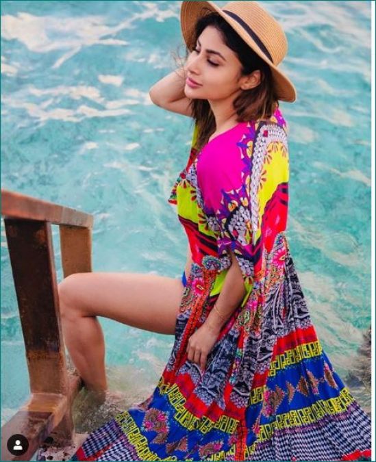 Mouni Roy flaunting her multi-color outfit