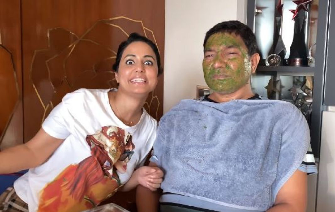 Hina is seen applying a neem face mask to her father