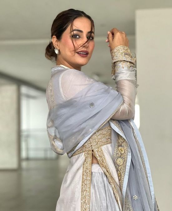 Hina Khan injuring fans in a grey Sharara suit with her killer acts