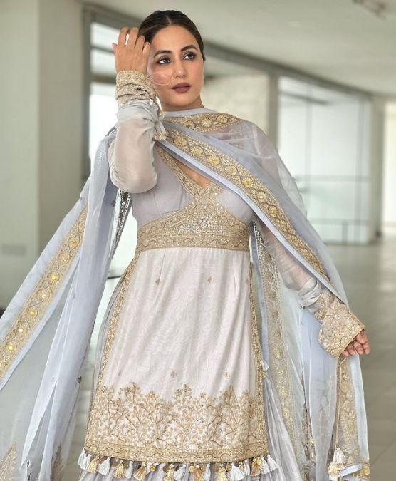 Hina Khan injuring fans in a grey Sharara suit with her killer acts