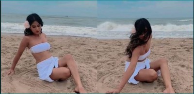 Nia Sharma seen playing with sand on sea shore, video goes viral