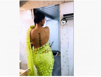 Wearing Net saree without a blouse, this actress hides the face