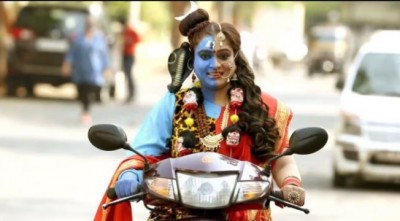 This famous actress came out with scooty in form of 'Ardhanarishvara'