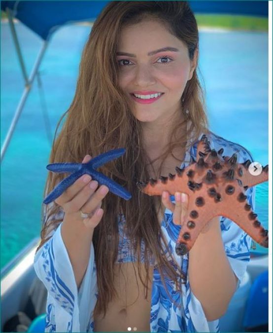 Rubina Dilaik enjoying holiday with starfish in blue bikini