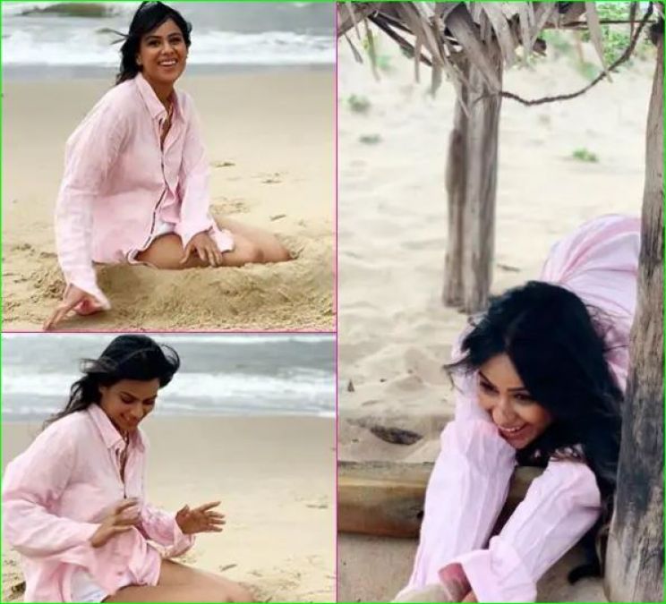 Nia Sharma seen playing in the sand in a pink dress, pictures are viral