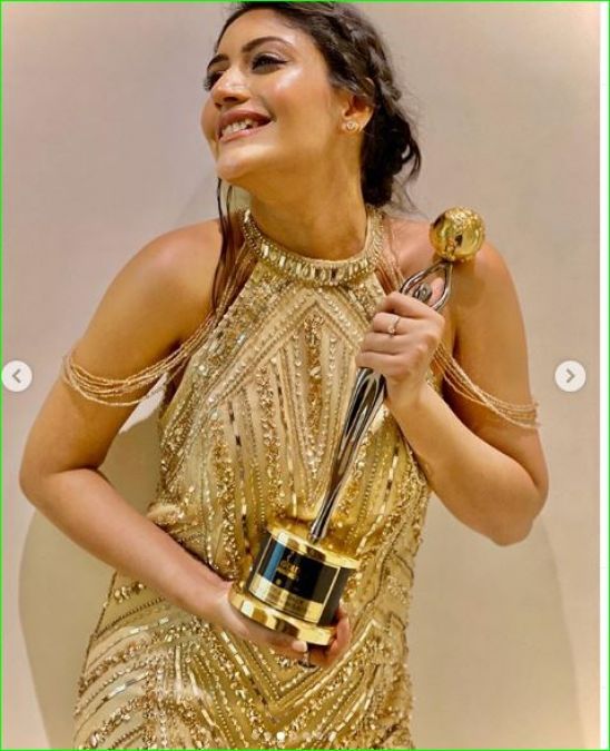 Surabhi Chandna stuns in a golden dress