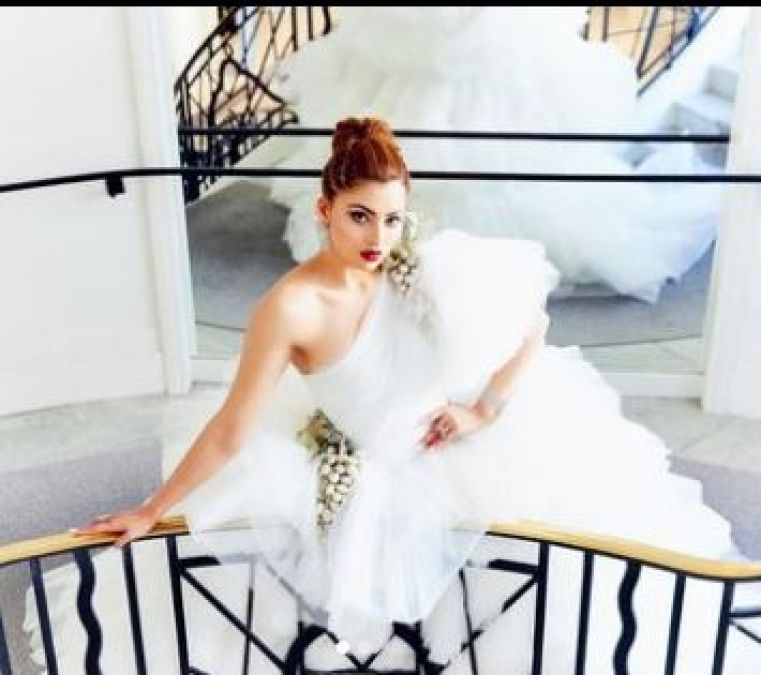 Urvashi Rautela's Breath Taking Look for a Film in a Beautiful White Gown