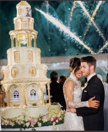 Watch Priyanka Chopra Nick Jonas  cut  6 tier, 18 feet wedding cake