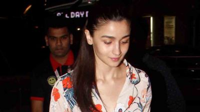 On first day of New year Alia Bhatt trolled for wearing a silk night-suit dress at airport