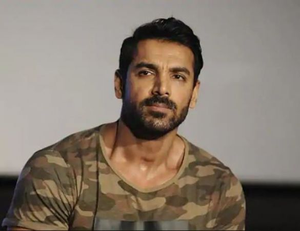 John Abraham's 'RAW poster out, check out the intense look of John here