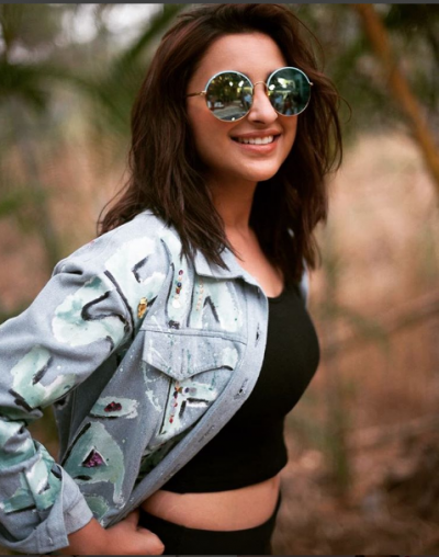 Parineeti Chopra looking super hot in her black attire with Blue denim  jacket