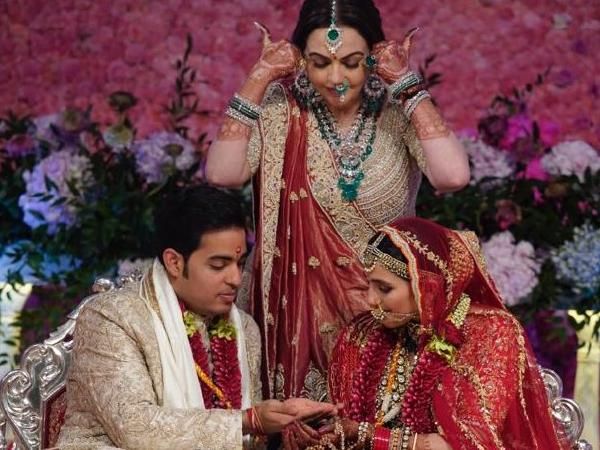 Mom Nita Ambani weaves Akash Ambani - Shloka's name on her wedding outfit
