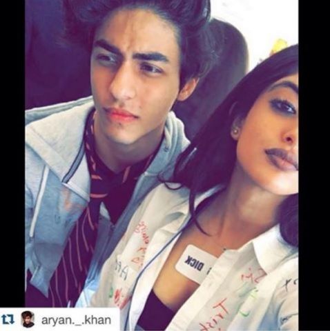 Navya and Aryan poses together at their last day of school