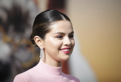 Is Selena Gomez really stocking this singer on social media?