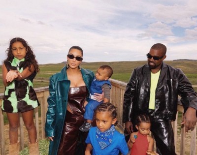Kim kardashian, Kanye West living separate lives but still together, Sources say
