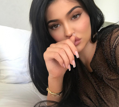 Kylie Jenner gives birth to the 'baby girl' and apologies for keeping her fans in the dark
