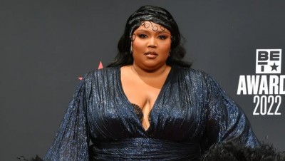 Lizzo reacts to Kanye West's fatphobic comment about her body