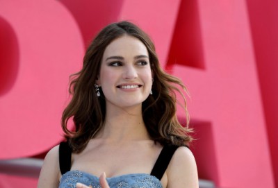 After kissing Dominic West, Lily James cancels her appearance