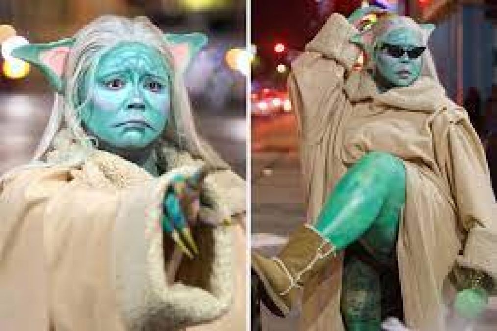 Dressed as Baby Yoda for Halloween, Lizzo strolls among Hollywood tourists wearing an unrecognizable dress