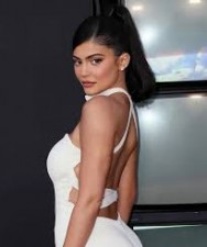 See pics: Kylie Jenner in a neon bikini while posing with daughter Stormi Webster