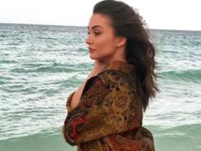 Amy Jackson shares her baby bump in this slow-motion video, watch it here